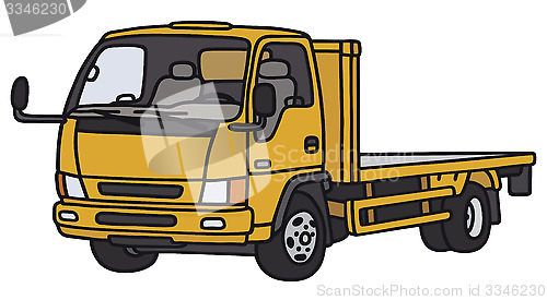 Image of Yellow small lorry