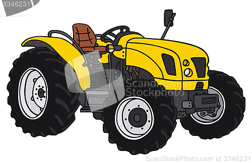 Image of Yellow small tractor
