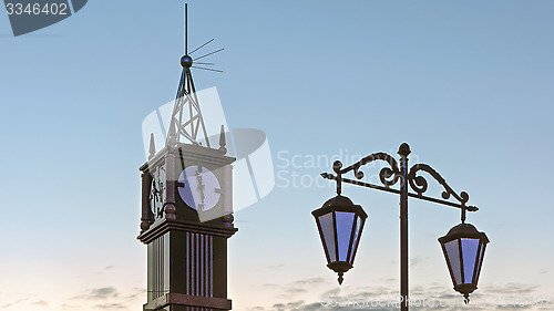 Image of Clock tower on white night sky background