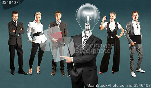 Image of Business Team With Lamp Head