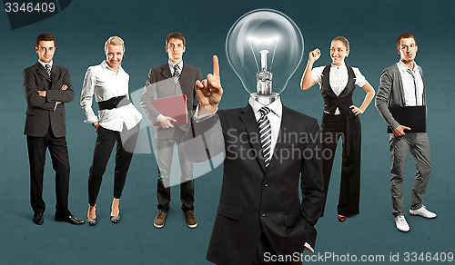 Image of Business Team With Lamp Head