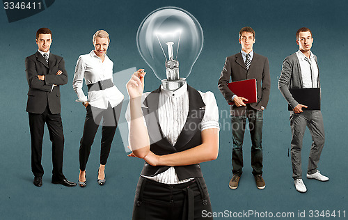 Image of Business Team With Lamp Head