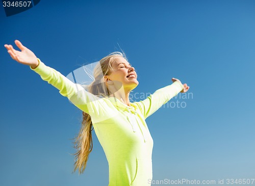 Image of woman doing sports outdoors