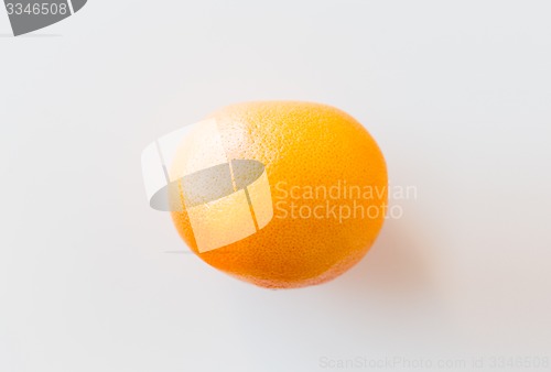 Image of ripe grapefruit over white