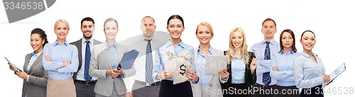 Image of group of happy businesspeople with money bags