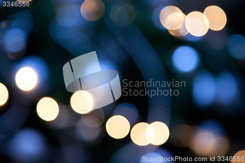 Image of bright lights on dark blue night background