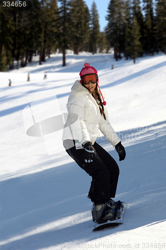 Image of Girl snowboarding