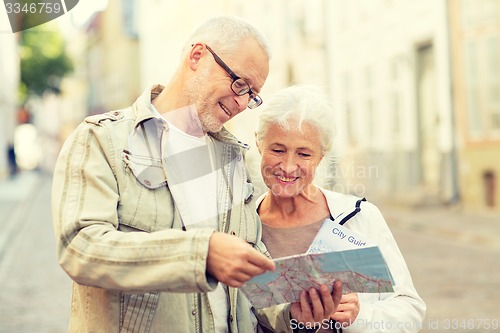 Image of senior couple on city street