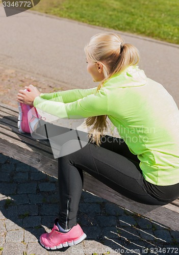 Image of woman doing sports outdoors