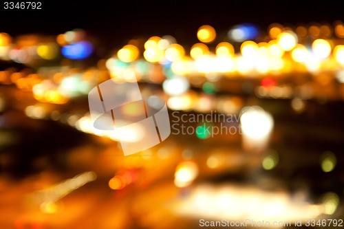 Image of golden bright lights on dark night background