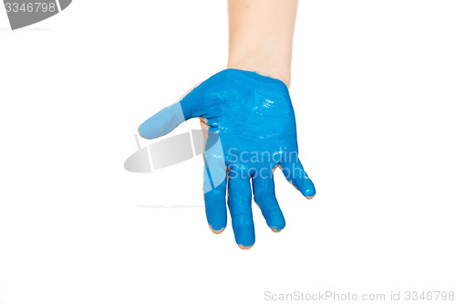 Image of human hand painted with blue color