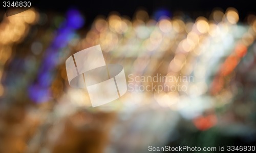 Image of colorful bright lights on dark night background