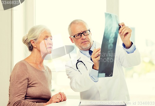 Image of senior woman and doctor meeting