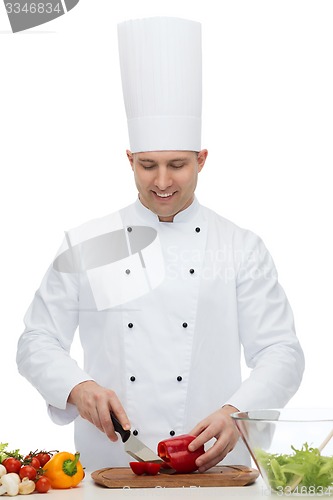 Image of happy male chef cook cooking food