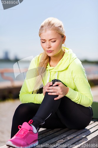 Image of woman doing sports outdoors