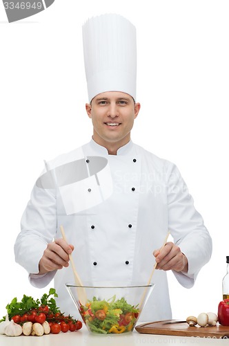 Image of happy male chef cook cooking food