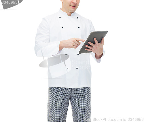 Image of close up of happy male chef cook holding tablet pc