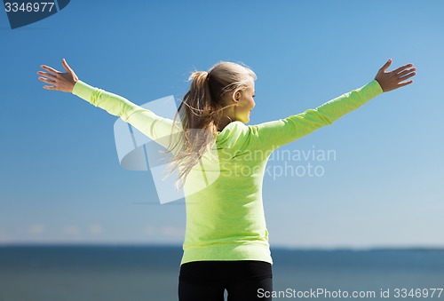 Image of woman doing sports outdoors