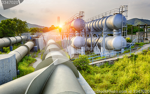 Image of Glow light of petrochemical industry on sunset.