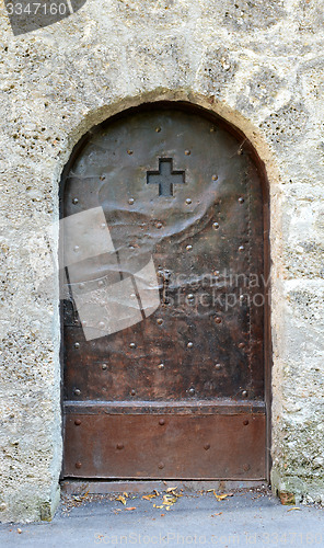 Image of Old studded metal door