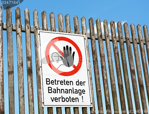 Image of German safety sign - keep off the railway