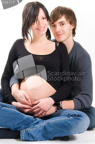 Image of young couple expecting a baby