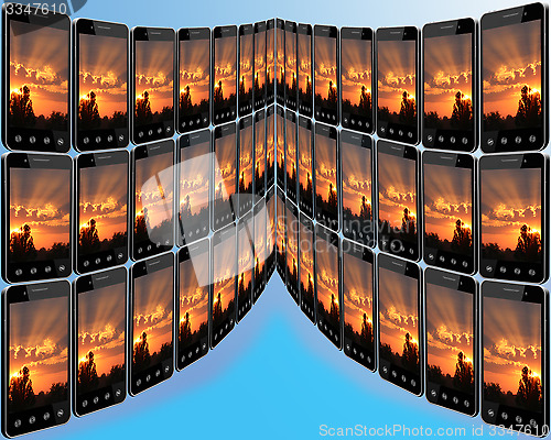 Image of smart-phones with sunset in rows