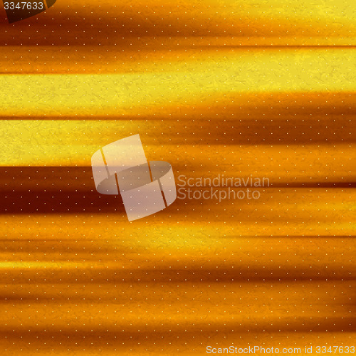 Image of Abstract gold background. Metal plate with reflected light. 