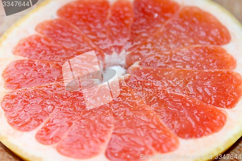 Image of grapefruit red cut by piece