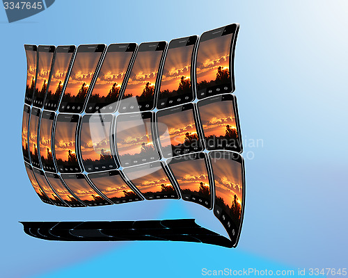 Image of smart-phones with sunset in strange shape
