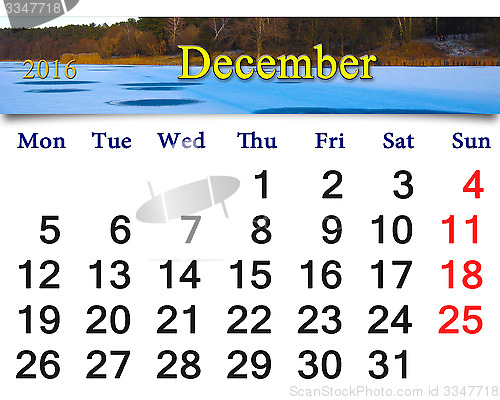 Image of calendar for December 2016 with winter river and forest