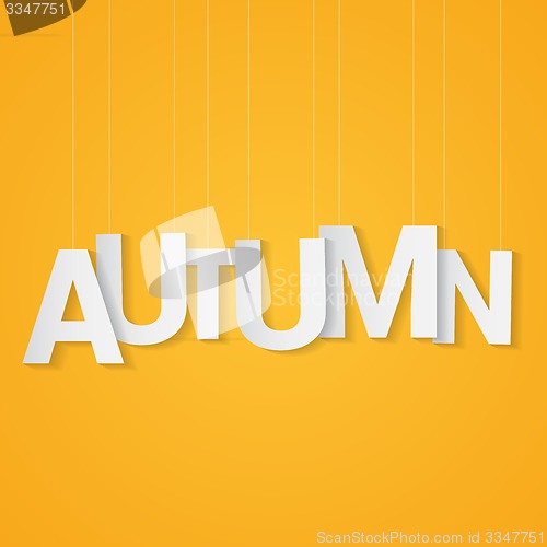 Image of Autumn paper letters, attached to string over yellow background. Can be use at flyer, banner or poster.