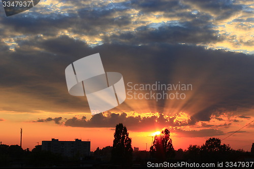 Image of Dark sunset above the multistory house