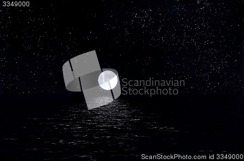 Image of Full Moon in the sky with stars and water