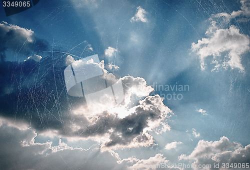 Image of Vintage sky background with dark border and retro texture.