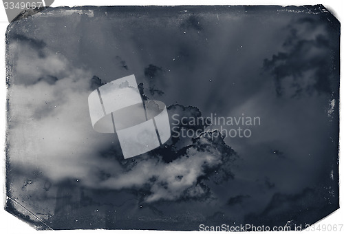 Image of Vintage sky background with dark border and retro texture.