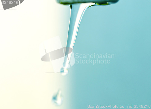 Image of Tap of running water isolated on grey background