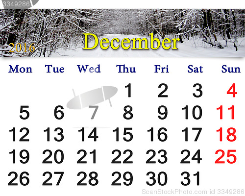 Image of calendar for December 2016 with picture of winter forest