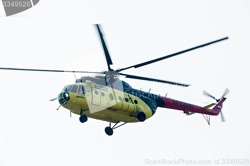 Image of MI-8 helicopter flying