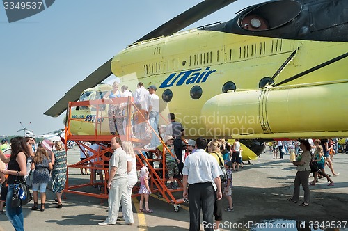 Image of Passengers make landing in Mi-10K helicopter. Russia