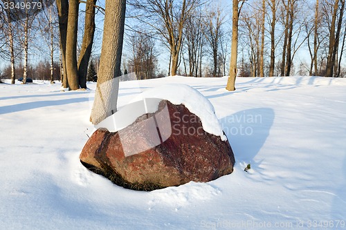 Image of stone under snow  