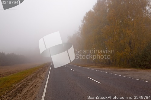 Image of the autumn road 