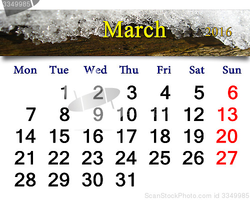 Image of Calendar for March 2016 with layer of snow on tree