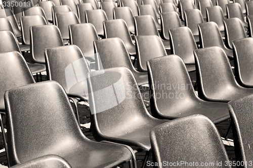 Image of empty seat in italy europe background black  texture
