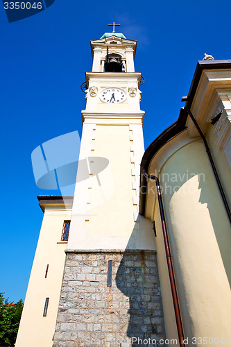 Image of ancien clock tower in    stone and bell