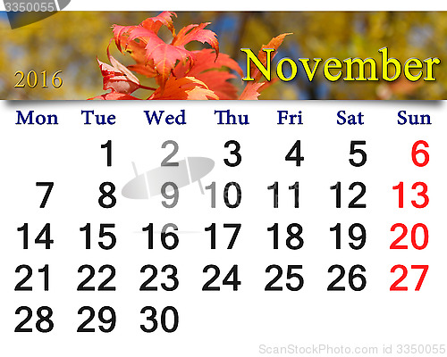 Image of calendar for November 2016 with red autumn leaves