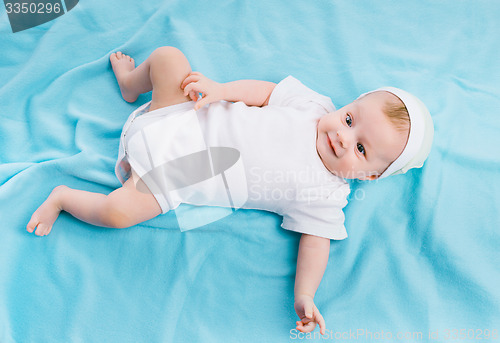 Image of baby on blue blanket
