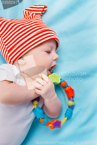 Image of baby on blue blanket