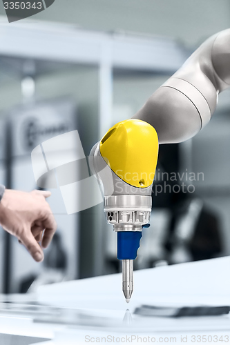 Image of Robotic arm closeup photo