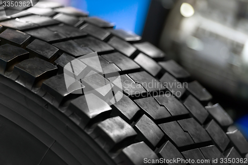 Image of New car tyre closeup photo